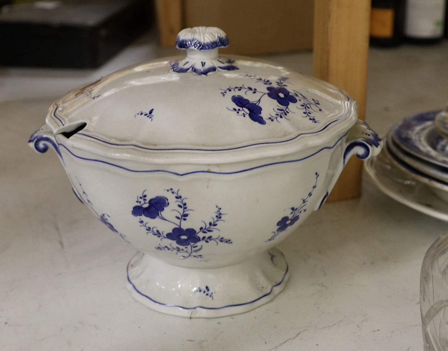 A quantity of assorted ceramics and glass including a group of 19 century blue and white pottery, a Victorian heavy cut glass decanter and stopper etc.